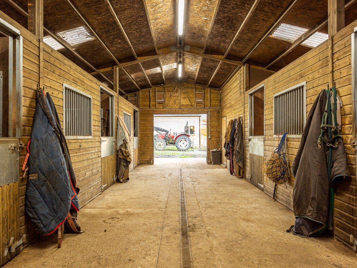An interior view of an American barn for horses