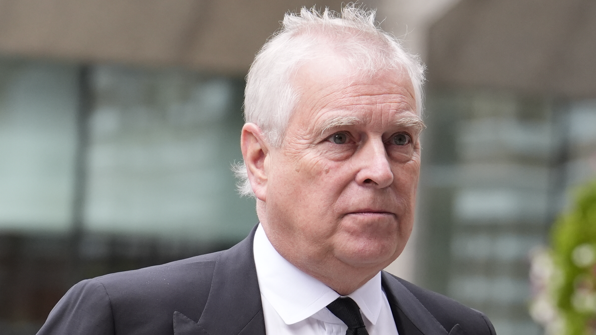 Prince Andrew wearing a dark suit