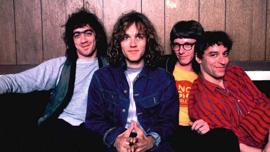 Bill Berry, Michael Stipe, Mike Mills and Peter Buck at the Aragon Ballroom in Chicago, Illinois, July 7, 1984