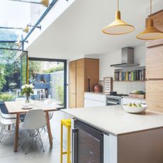 Single storey kitchen-diner extension with natural units, overhead glazing and tonnes of natural light