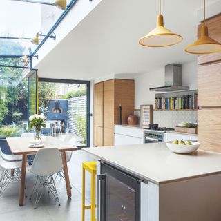 Single storey kitchen-diner extension with natural units, overhead glazing and tonnes of natural light