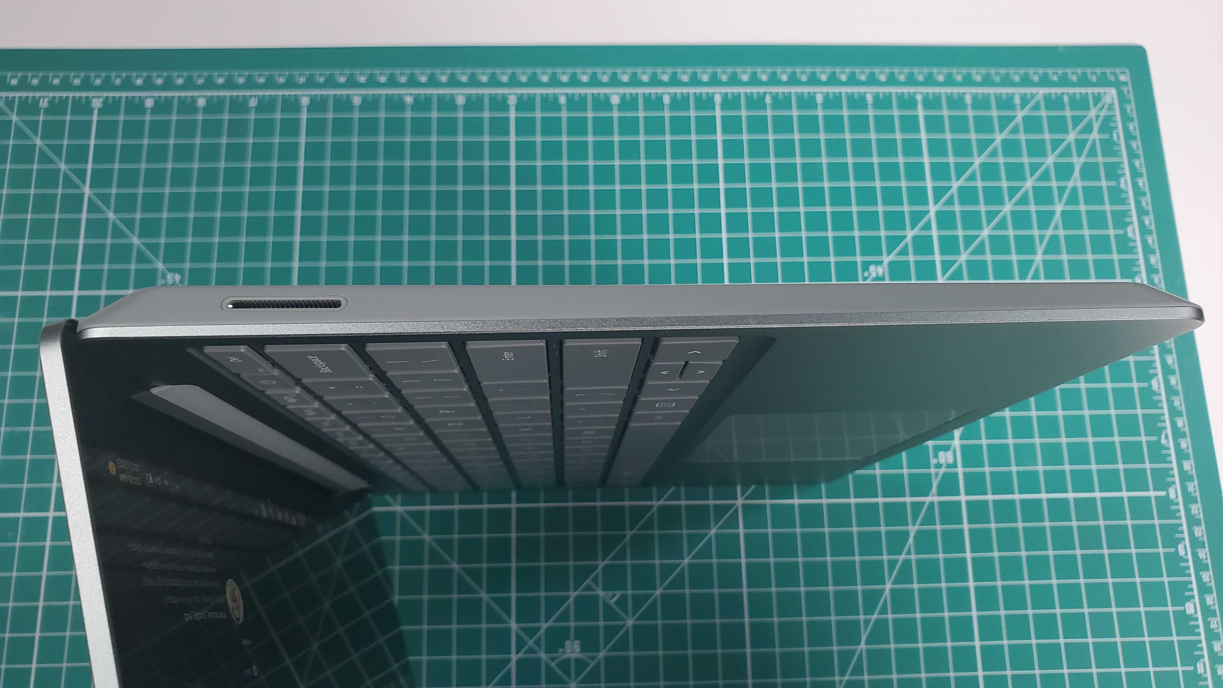 side view of a green laptop