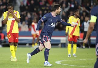 Lionel Messi celebrates after scoring for PSG against Lens in Ligue 1 in 2022.