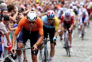 Mathieu van der Poel attacks up Rue Lepic with only Wout van Aert able to follow