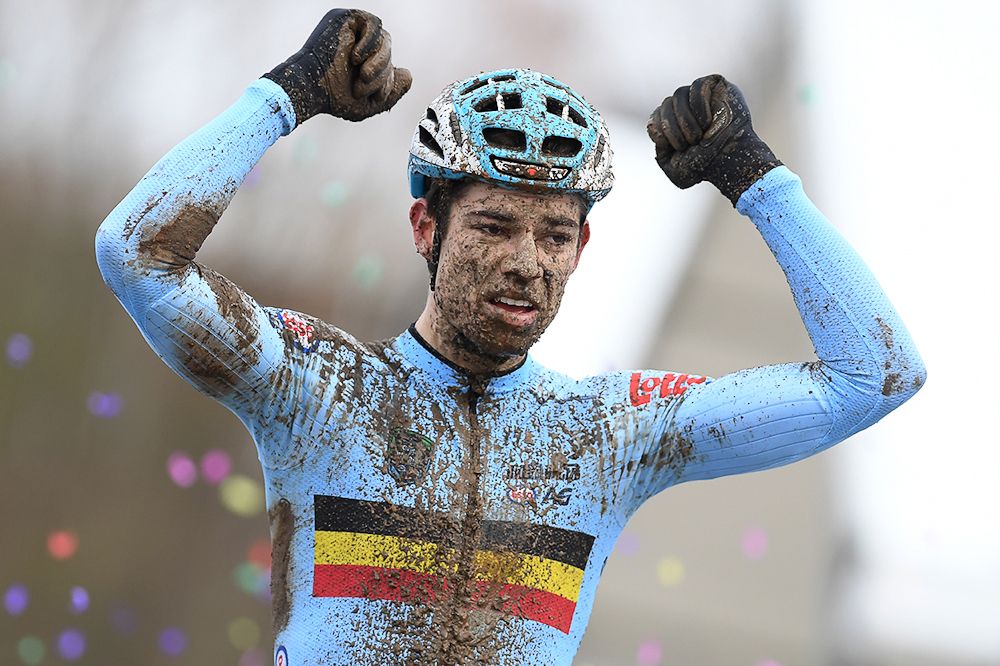 Wout Van Aert celebrates winning his second consecutive rainbow jersey