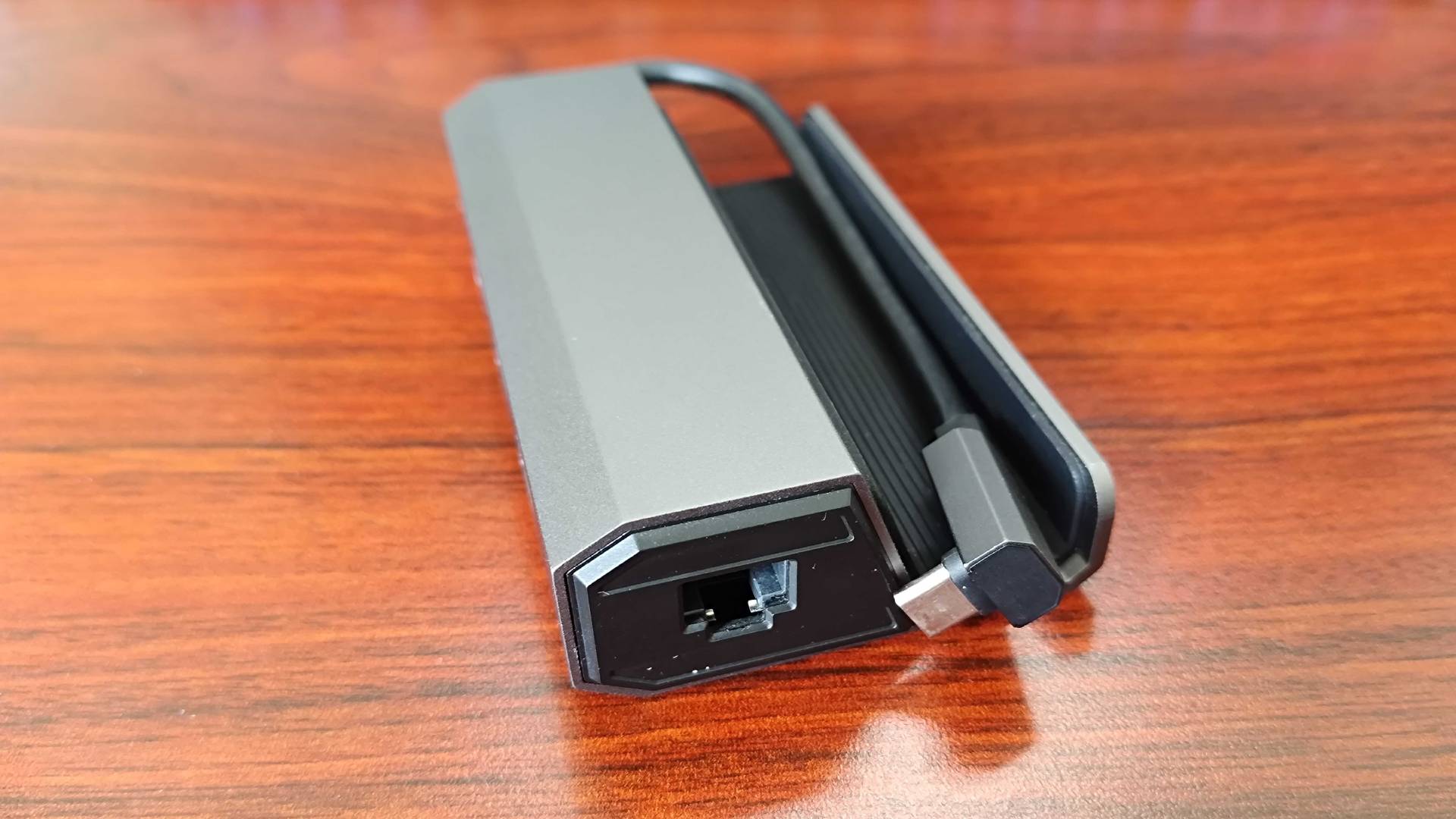 Side of Jsaux 5-in-1- Steam Deck dock with Ethernet port in view.