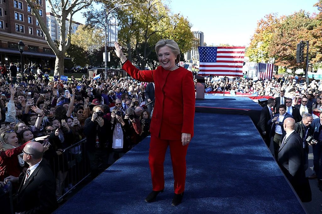 Democratic presidential candidate Hillary Clinton greets supporters on Nov. 7, 2016, wearing her signature pantsuit. 