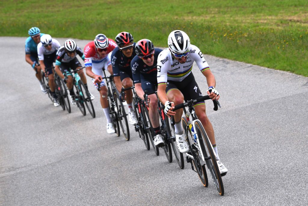 PFAFFNAU SWITZERLAND JUNE 08 Mathieu Van Der Poel of Netherlands and Team AlpecinFenix Richard Carapaz of Ecuador Eddie Dunbar of Ireland and Team INEOS Grenadiers Julian Alaphilippe of France and Team Deceuninck QuickStep in the Breakaway during the 84th Tour de Suisse 2021 Stage 3 a 185km stage from Lachen to Pfaffnau 509m UCIworldtour tds tourdesuisse on June 08 2021 in Pfaffnau Switzerland Photo by Tim de WaeleGetty Images