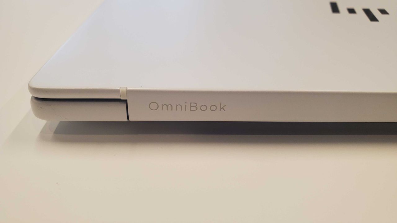 white laptop on table