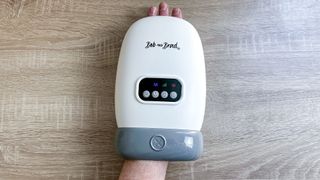 Bob & Brad Hand Massager on a desk