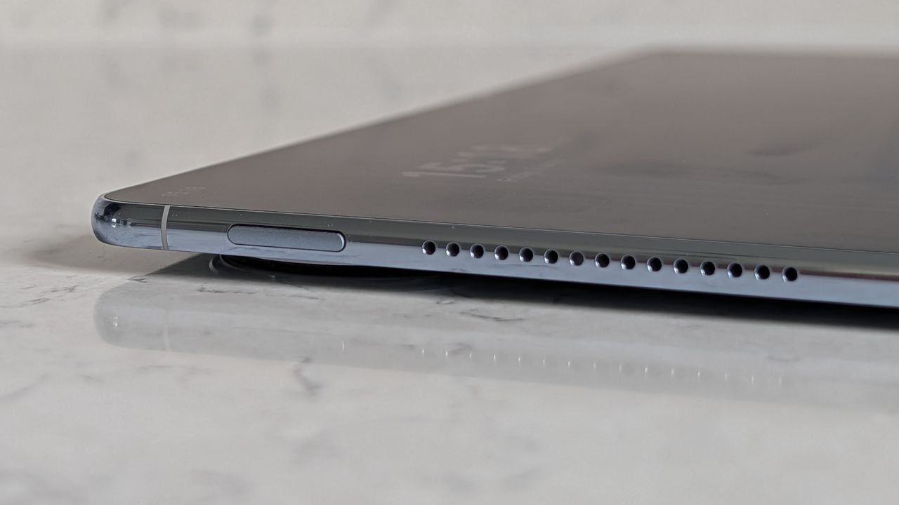Photos of the Huawei MatePad Pro Max resting on a marble table