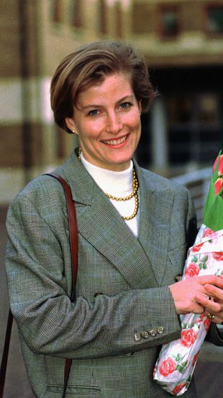 Duchess Sophie holding flowers on her 30th birthday in 1995