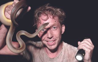 Jack Randall with a water python