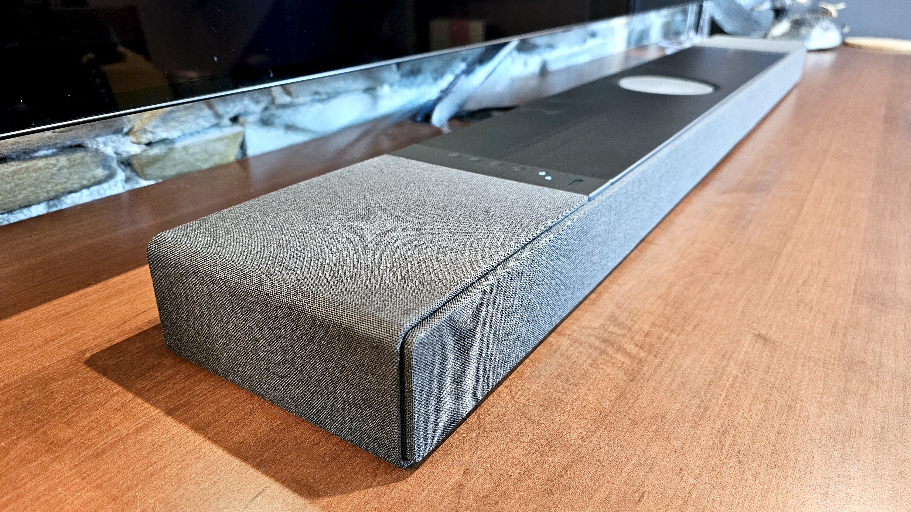 KEF XIO on table. Close up shots showing design features