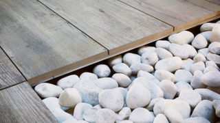 wood effect porcelain paving with white pebbles
