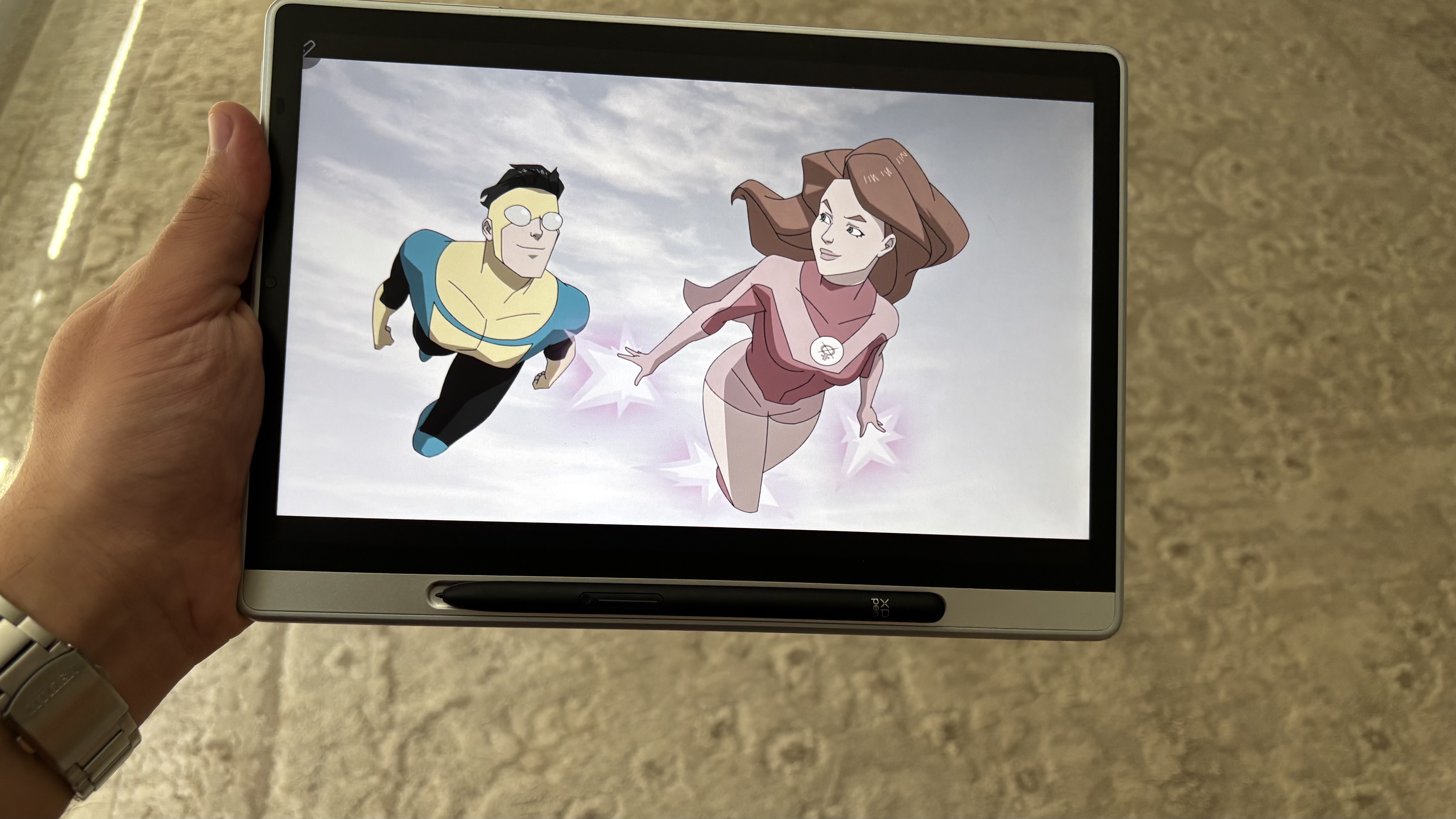 Watching Invincible in regular mode and color paper mode