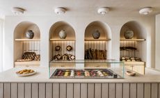 Liberté paris bakery breads and pastries on display in minimalist interior designed by Emmanuelle Simon