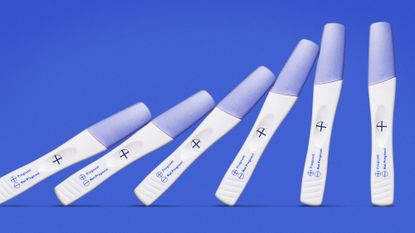 Pregnancy tests toppling in a row