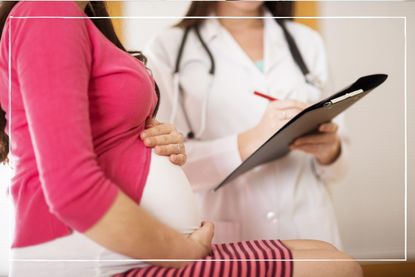 Women talking to doctor about pre-eclampsia