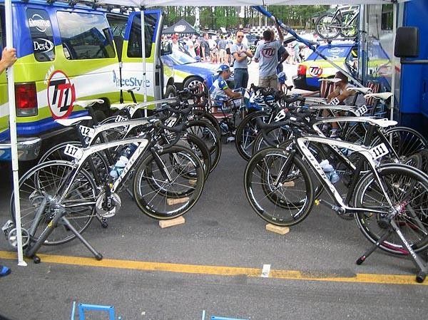 The time trial bikes are set up and waiting in the pit zone.