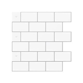 A slab of white rectangular subway tiles with gray grout