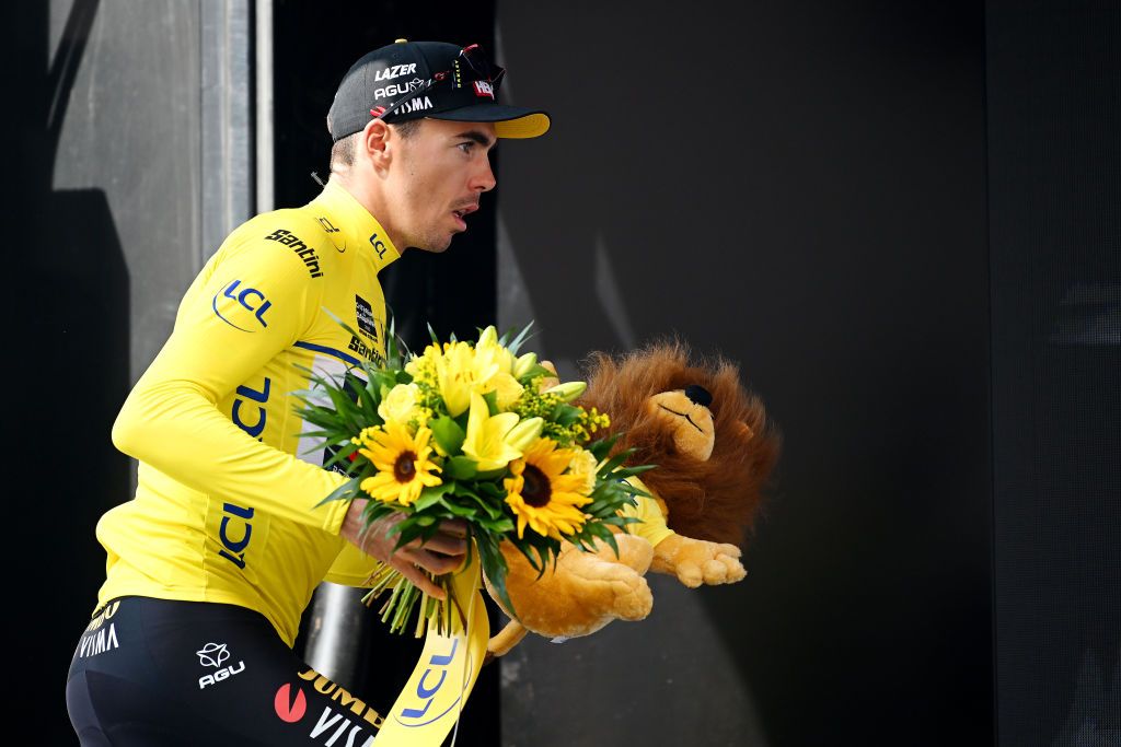 LE COTEAU FRANCE JUNE 06 EDITORS NOTE Alternate crop Christophe Laporte of France and Team JumboVisma celebrates at podium as Yellow leader jersey winner during the 75th Criterium du Dauphine 2023 Stage 3 a 1941km stage from MonistrolsurLoire to Le Coteau UCIWT on June 06 2023 in Le Coteau France Photo by Dario BelingheriGetty Images