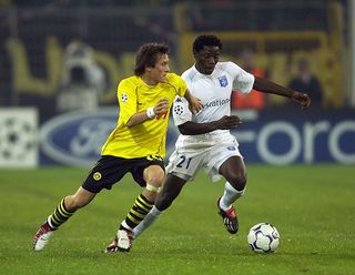 Tomas Rosicky of Dortmund and Benjani of Auxerre during The Champions League group A match between BV Borussia Dortmund and AJ Auxerre at The Westfalen Stadium in Dortmund, Germany on September 25, 2002.