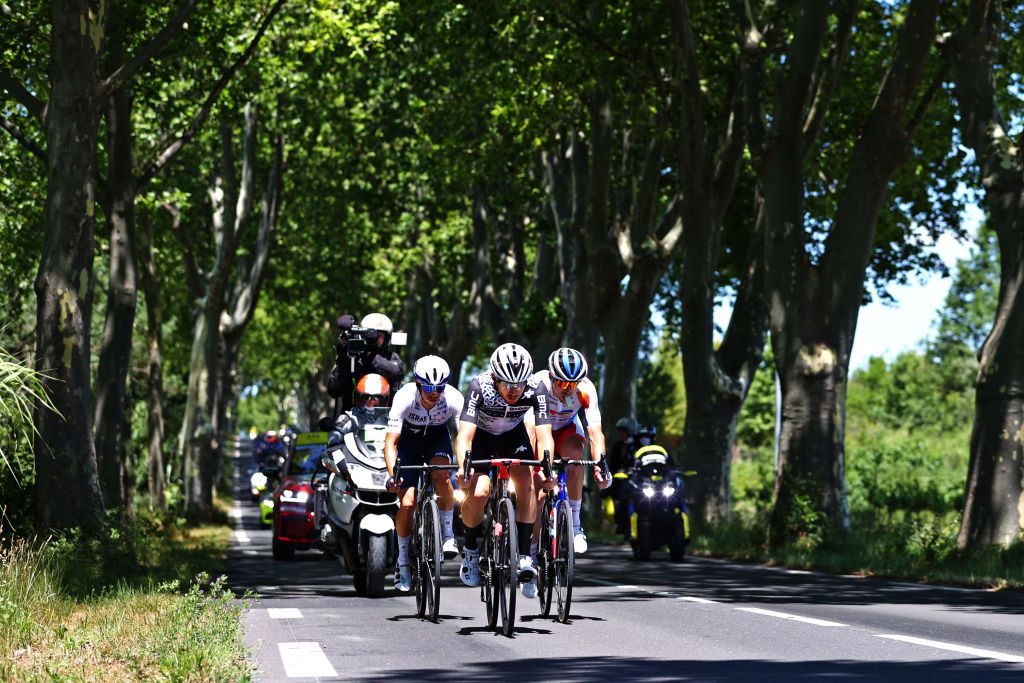 CARCASSONNE FRANCE JULY 09 Omer Goldstein of Israel and Team Israel StartUp Nation Sean Bennett of The United States and Team Qhubeka NextHash Pierre Latour of France and Team TotalEnergies in the Breakaway during the 108th Tour de France 2021 Stage 13 a 2199km stage from Nmes to Carcassonne LeTour TDF2021 on July 09 2021 in Carcassonne France Photo by Michael SteeleGetty Images