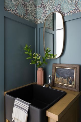 powder room with panelling and wallpaper