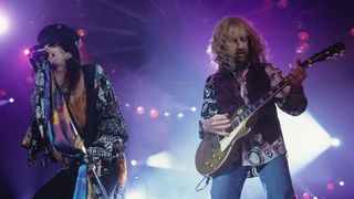 Singer Steven Tyler and guitarist Brad Whitford of Aerosmith perform on stage at Wembley Arena in London, England in December 07, 1993.