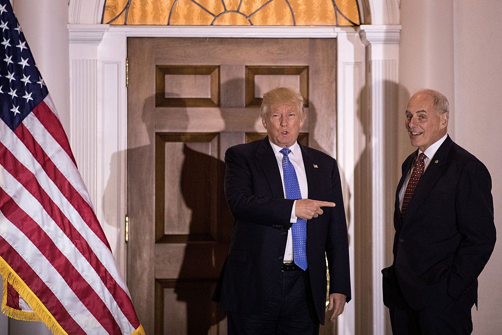 President-elect Donald Trump points at U.S. Marine Corps General John Kelly.