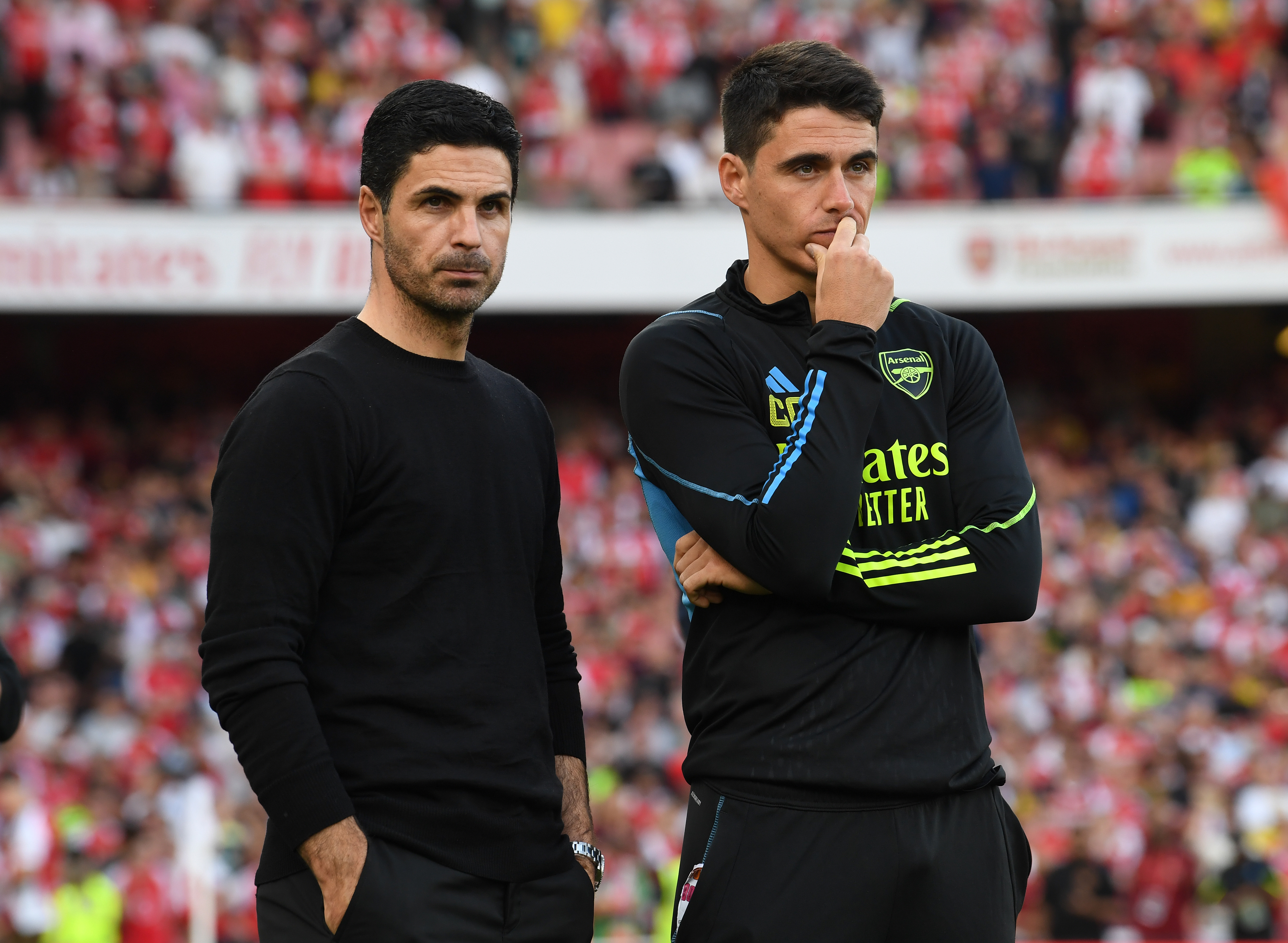 Arsenal manager Mikel Arteta alongside assistant Carlos Cuesta.