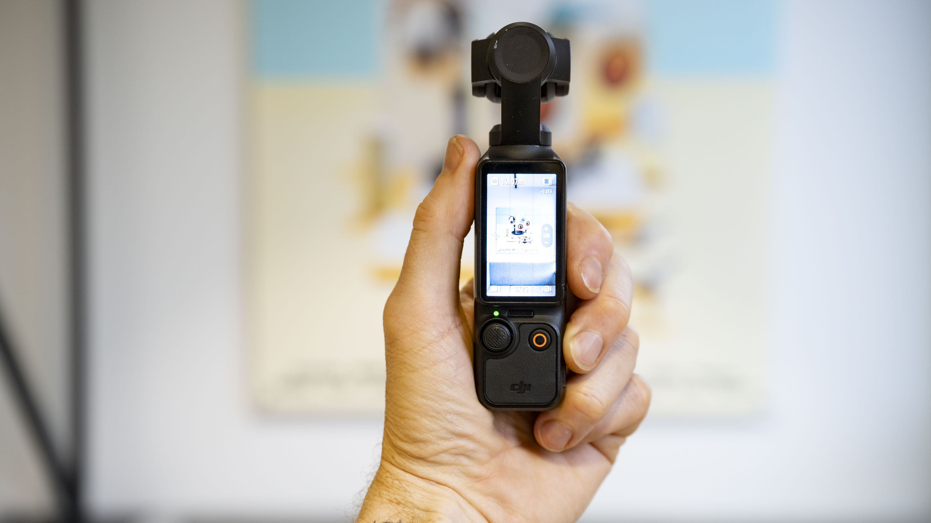DJI Osmo Pocket 3 vlogging camera in user's hand