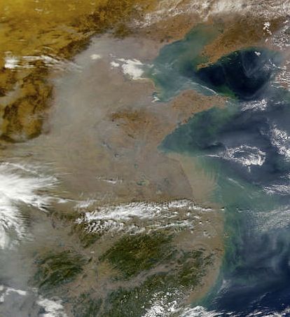 Pollution over China creates gray haze.