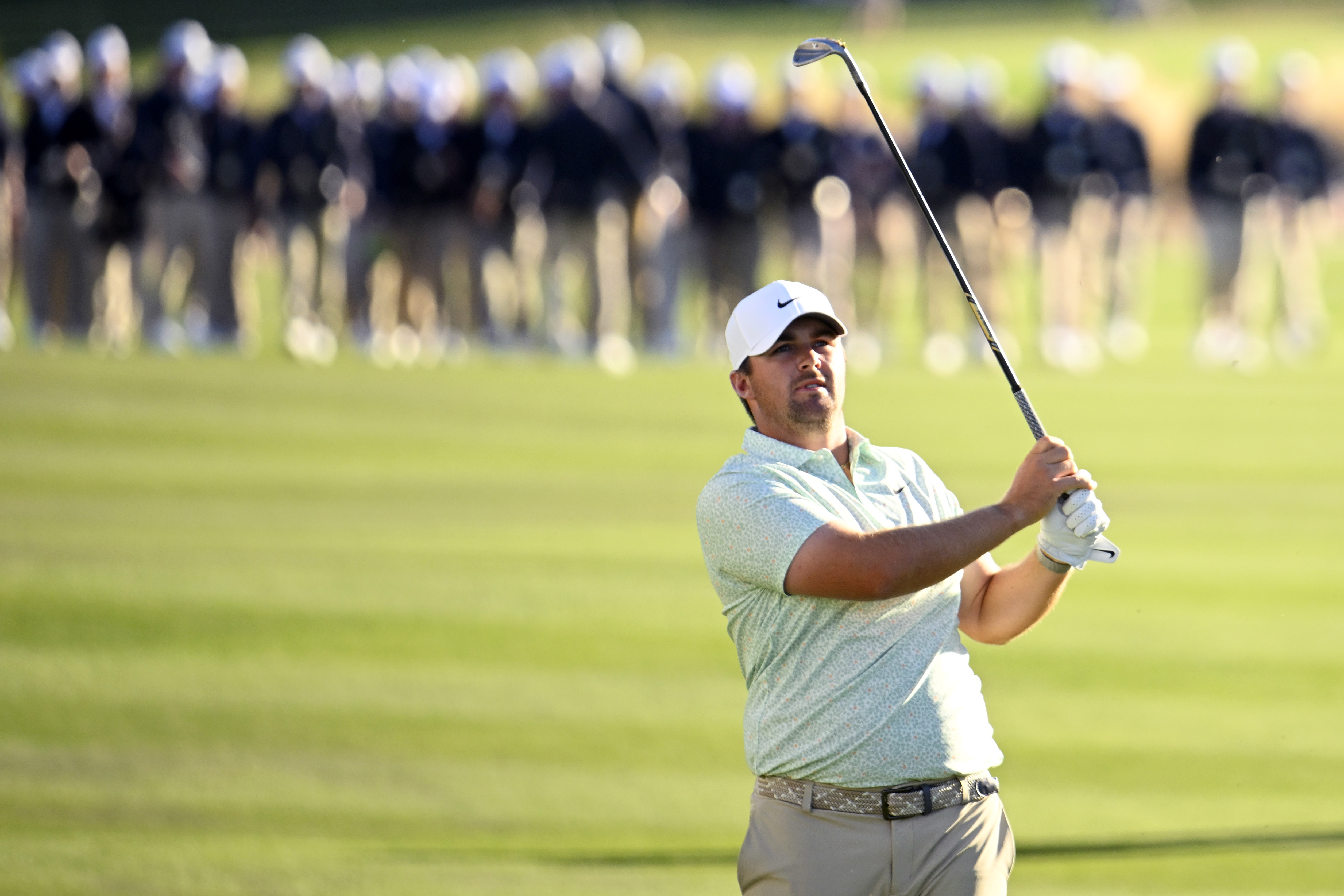 Chris Gotterup hits a wedge into the green