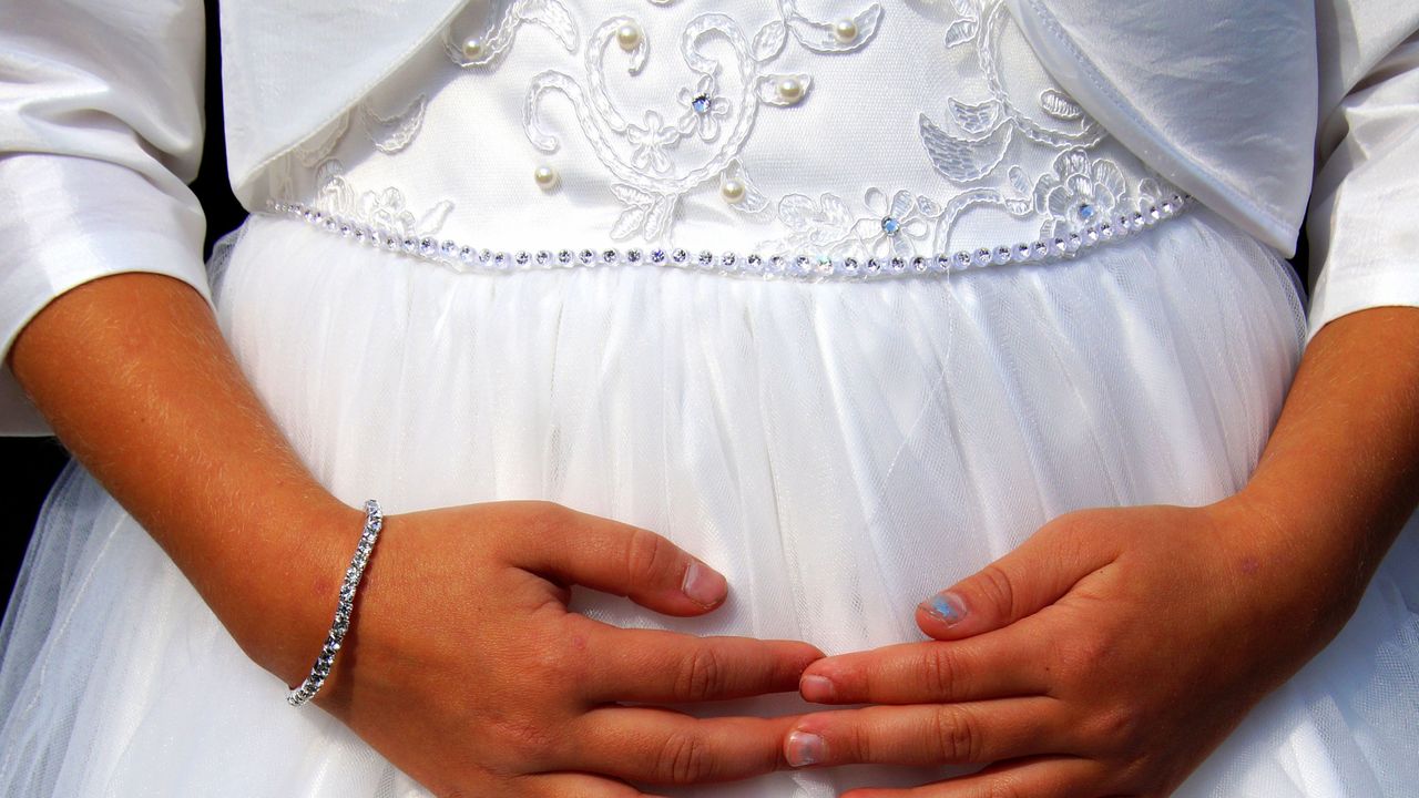 Bridesmaid in a white dress