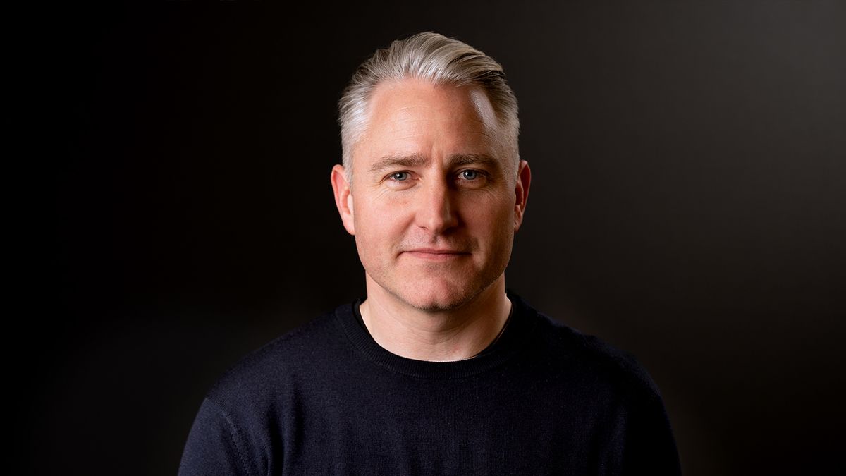 Free Partners&#039; founder Guy Cornet - white man in a black t-shirt on a black background