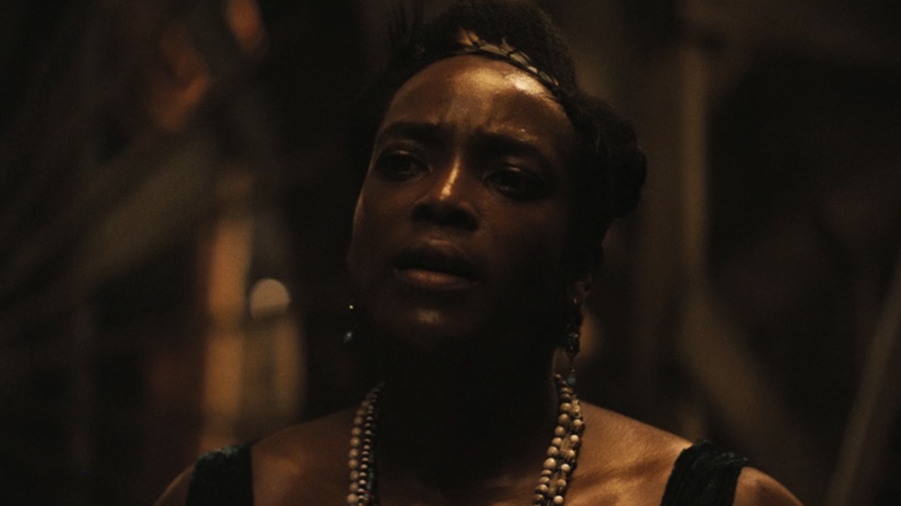 Annie in Sinners at the door of the joint.