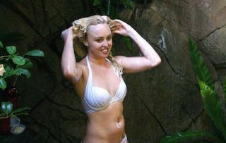 Jorgie Porter takes a dip in the camp pool