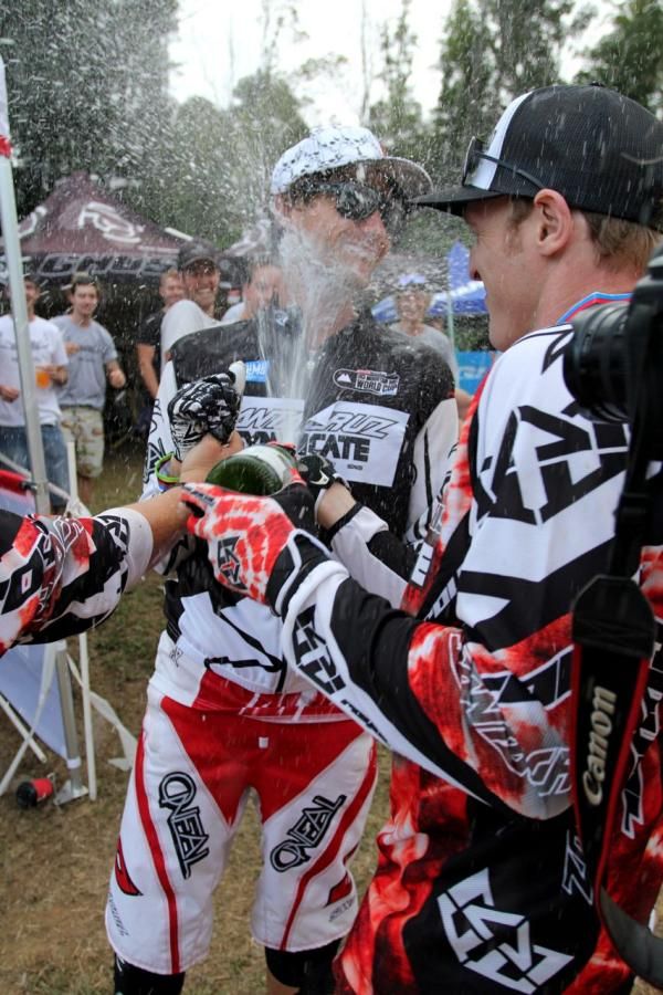 Greg Minnaar and Steve Peat celebrate