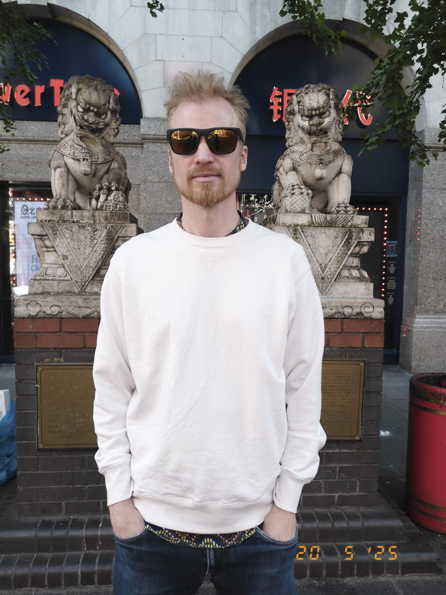 Male portrait in London's china town, street scene