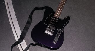 Fender Player II Modified Telecaster SH: the factory-modded, humbucker-equipped Telecaster is finished in Dusk, a dark metallic purple, and is photographed backstage.