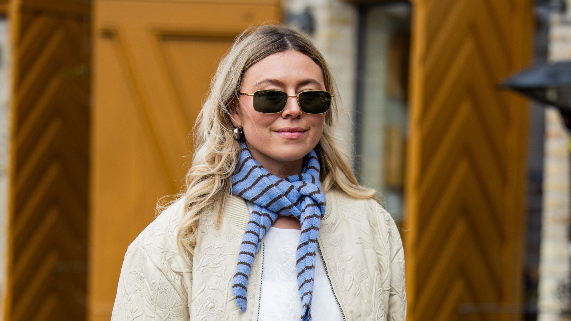 blonde woman wearing sunglasses