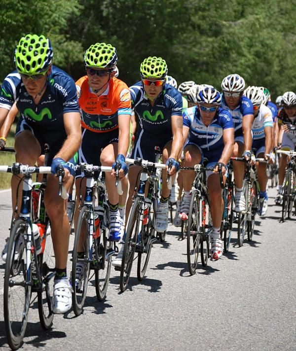 Race leader Xavier Tondo (Movistar) is tucked in behind his teammates in the peloton.