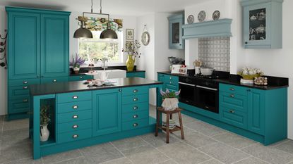 Teal kitchen scheme with focal point island and dark countertops