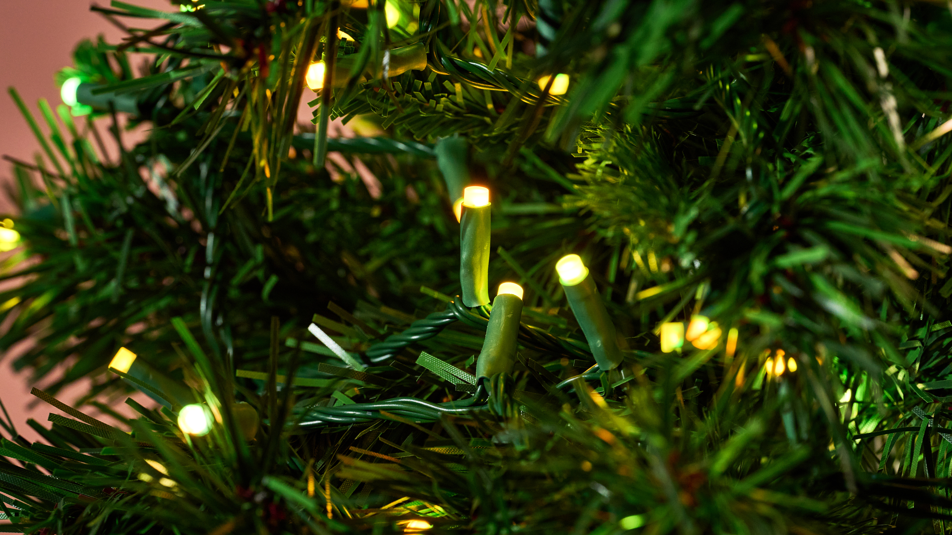 A close-up of the Govee Sparkle String Lights on a Christmas tree.