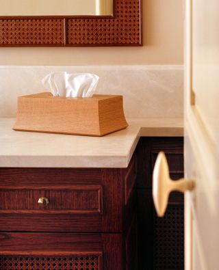Wooden tissue box by Pierre Yovanovitch on sideboard