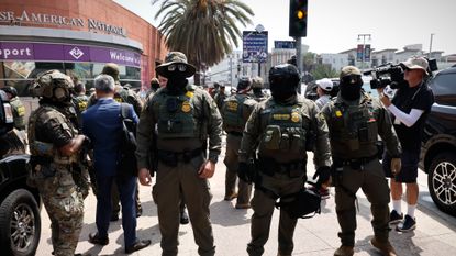 Border Patrol agents in full face masks in Los Angeles