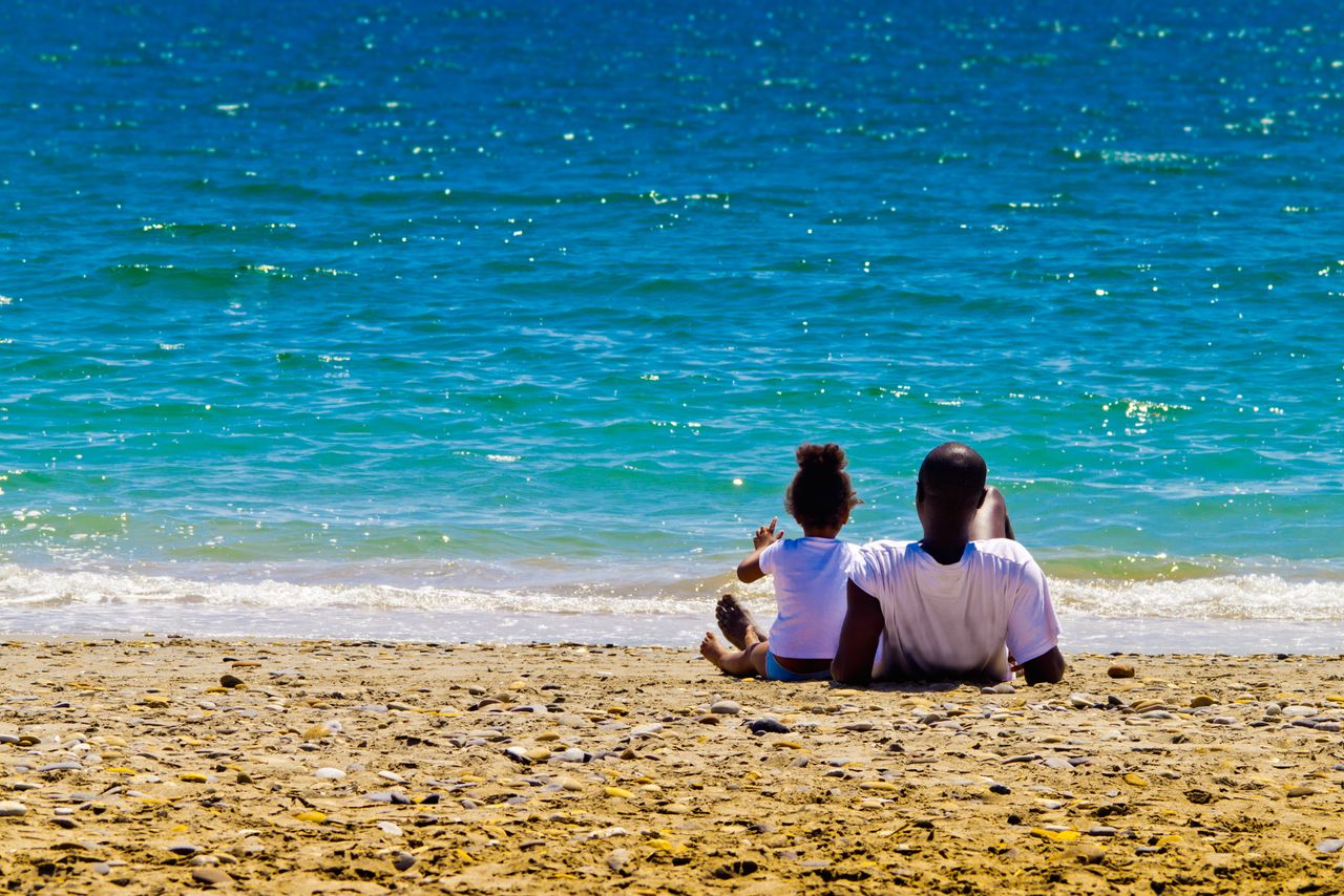 A father and daughter.