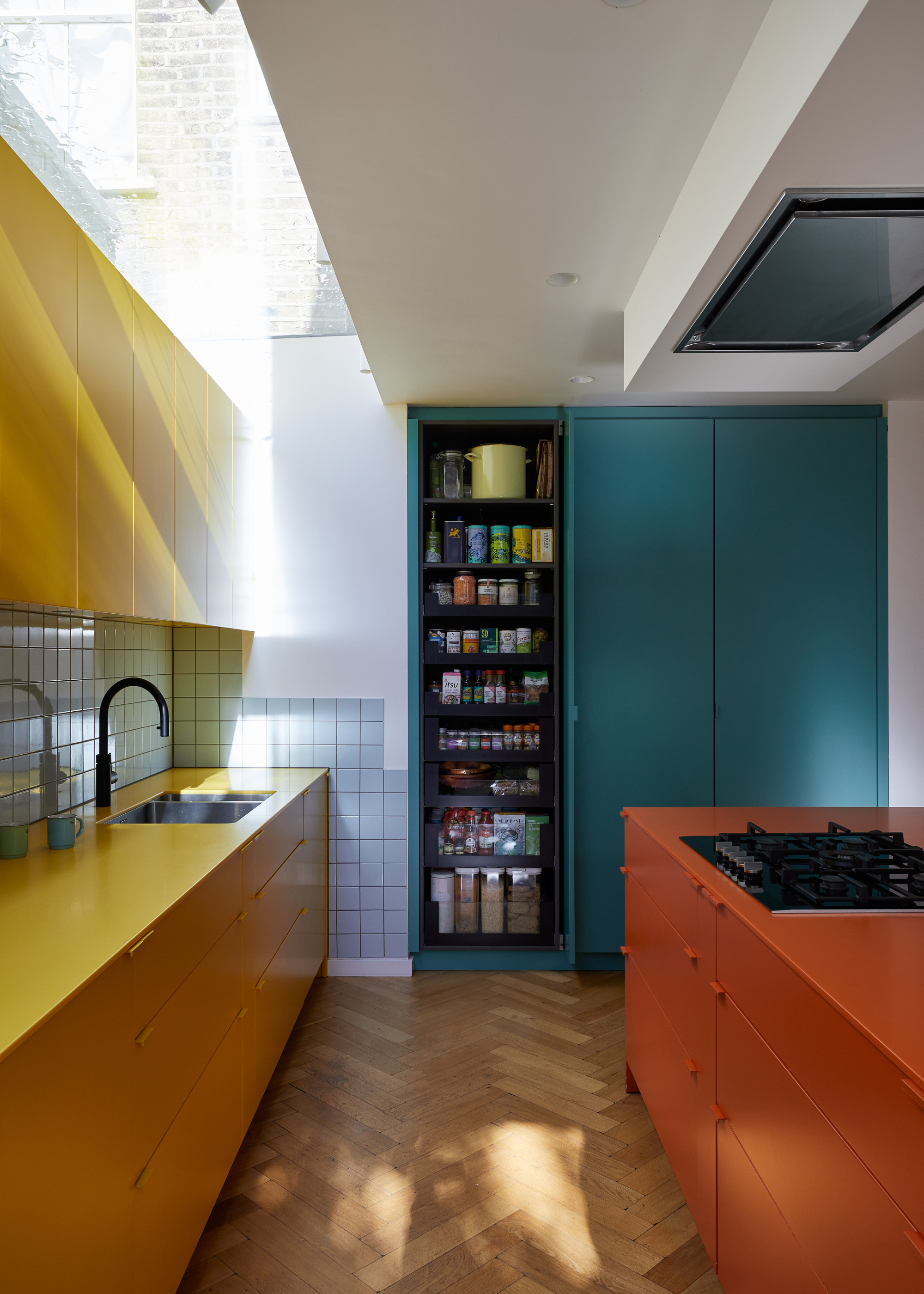 color block himac kitchen with blue cabinets